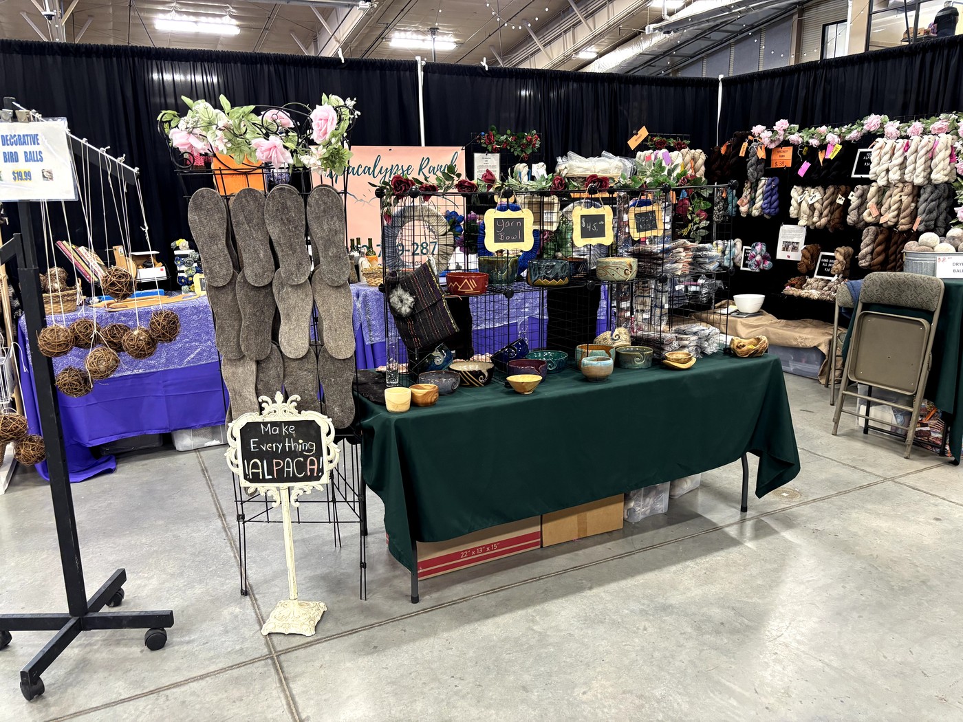 Alpacalypse Ranch booth at a fiber festival — click to enlarge