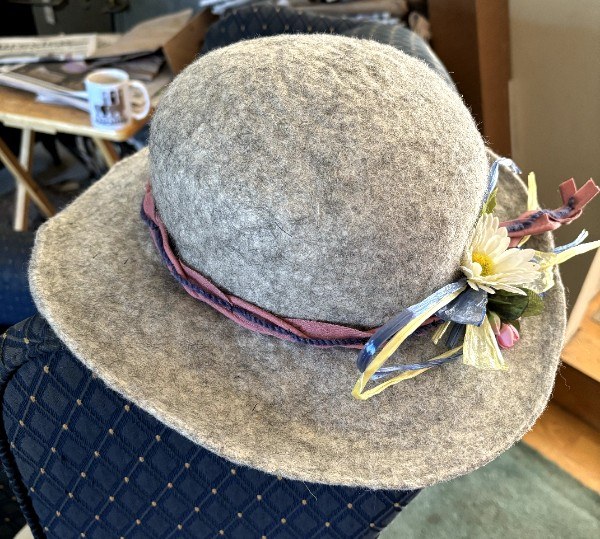 Handmade felted alpaca hat with ribbon and flowers